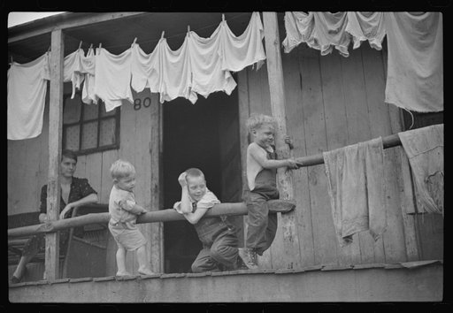Untitled photo, possibly related to: Coal miner's shack and some of his family, Pursglove, West Virginia