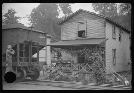 Untitled photo, possibly related to: Train pulling coal through center of town morning and evenings, Osage, West Virginia