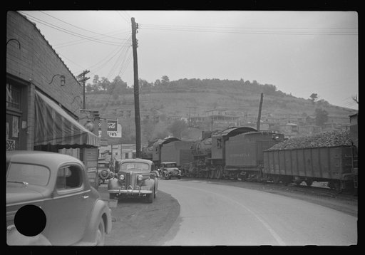 Untitled photo, possibly related to: Train pulling coal through center of town morning and evenings, Osage, West Virginia