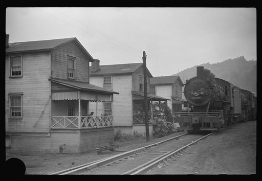 Untitled photo, possibly related to: Train pulling coal through center of town morning and evenings, Osage, West Virginia