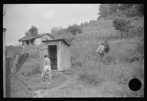 Untitled photo, possibly related to: Neighbors take home slop for pig, also any extra corn. Bertha Hill, West Virginia
