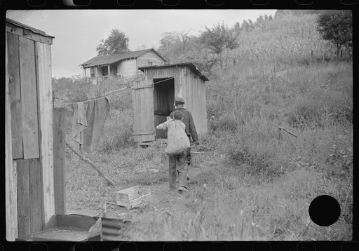 Untitled photo, possibly related to: Neighbors take home slop for pig, also any extra corn. Bertha Hill, West Virginia