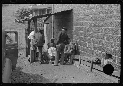 Untitled photo, possibly related to: Card gambling in center of town, Osage, West Virginia
