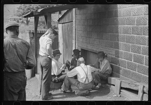 Untitled photo, possibly related to: Card gambling in center of town, Osage, West Virginia
