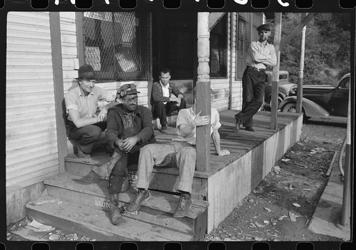 Coal miners on steps of company store, Scotts Run, West Virginia