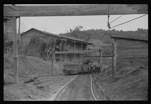 Coal miners switching motor. Note live wires. The "Patch," Chaplin, West Virginia