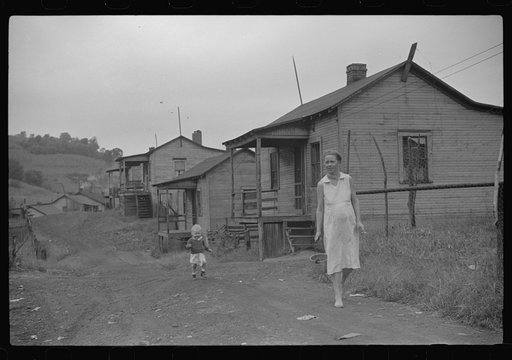 Untitled photo, possibly related to: Coal miner's wife bringing home the groceries on payday from company store, Chaplin, West Virginia