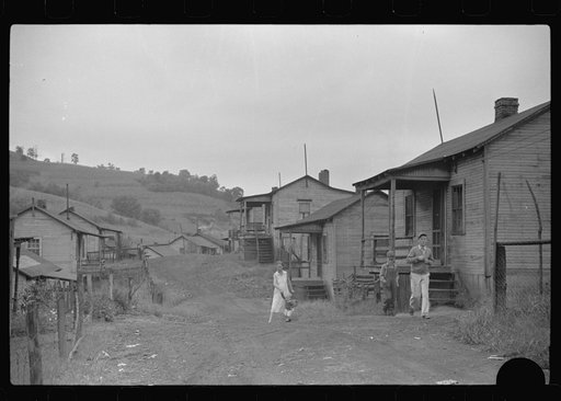 Untitled photo, possibly related to: Coal miner's wife bringing home the groceries on payday from company store, Chaplin, West Virginia