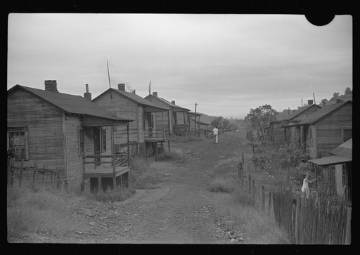 Untitled photo, possibly related to: Coal miner's wife bringing home the groceries on payday from company store, Chaplin, West Virginia