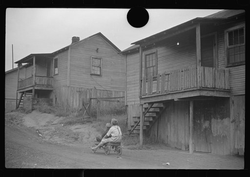 Untitled photo, possibly related to: Coal miners' children playing in front of their homes, Chaplin, West Virginia