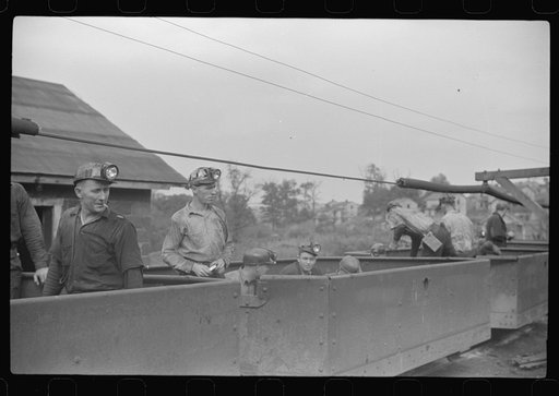 Untitled photo, possibly related to: Coal miner waiting for car to go in on next trip, Maidsville, West Virginia