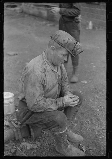 Coal miner waiting for the next shift, Bertha Hill, Scotts Run, West Virginia
