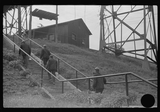 Untitled photo, possibly related to: Coal miners going up to mine for the next trip, Maidsville, West Virginia