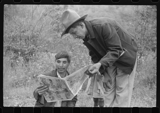 Mexican miners looking at "funny papers." Bertha Hill, Scotts Run, West Virginia