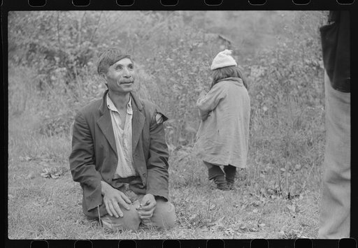 Untitled photo, possibly related to: Mexican miners looking at "funny papers." Bertha Hill, Scotts Run, West Virginia