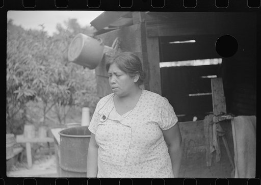 Untitled photo, possibly related to: Mexican miner's wife and child are visited by another miner's wife (Hungarian) who is interested in starting a maternal health clinic there. Scotts Run, Bertha Hill, West Virginia