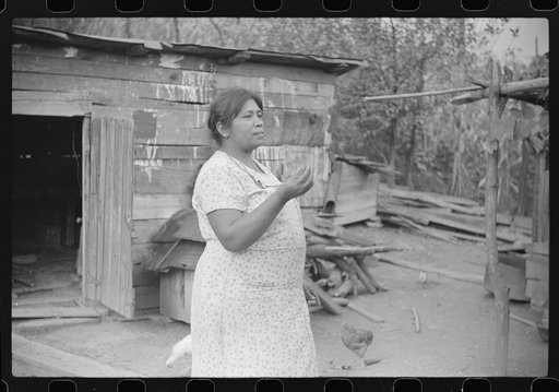 Untitled photo, possibly related to: Mexican miner's wife and child are visited by another miner's wife (Hungarian) who is interested in starting a maternal health clinic there. Scotts Run, Bertha Hill, West Virginia