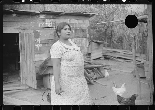 Untitled photo, possibly related to: Mexican miner's wife and child are visited by another miner's wife (Hungarian) who is interested in starting a maternal health clinic there. Scotts Run, Bertha Hill, West Virginia