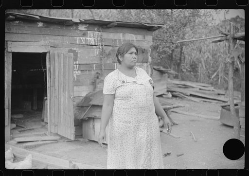 Untitled photo, possibly related to: Mexican miner's wife and child are visited by another miner's wife (Hungarian) who is interested in starting a maternal health clinic there. Scotts Run, Bertha Hill, West Virginia