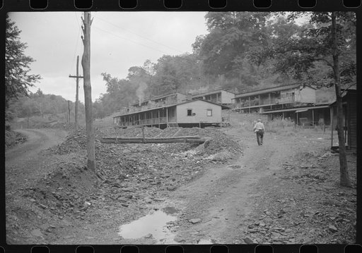 Coal miners' homes, company houses, with piles of slag and slate. "The Patch," Cassville, West Virginia