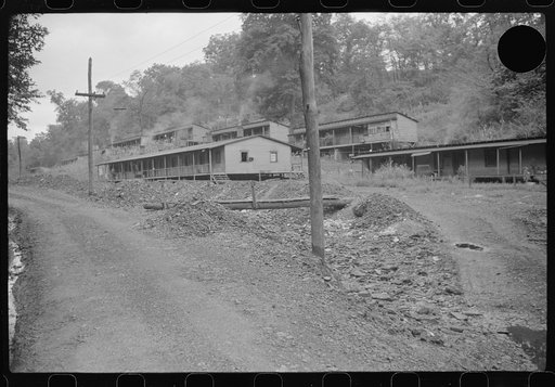 Untitled photo, possibly related to: Coal miners' homes, company houses, with piles of slag and slate. "The Patch," Cassville, West Virginia
