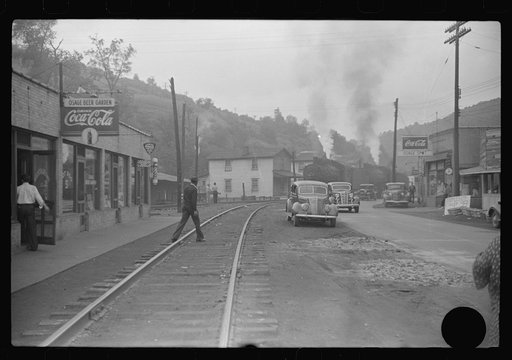 Untitled photo, possibly related to: Train pulling coal through center of town morning and evening, Osage, West Virginia