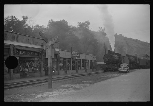 Untitled photo, possibly related to: Train pulling coal through center of town morning and evening, Osage, West Virginia