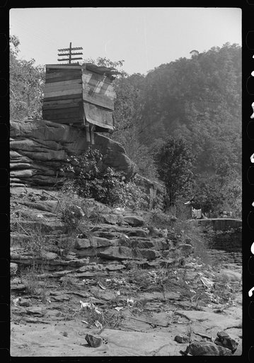 Privy used by Negroes living in shacks on highway between Charleston and Gaauley Bridge, West Virginia