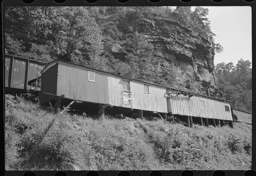 Old boxcars often converted into homes along highway between Charleston and Gauley Bridge, West Virginia
