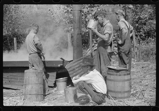Racine, West Virginia. Making molasses is hot work