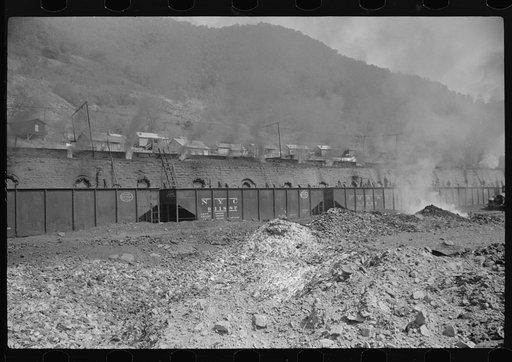 Coke ovens and burning slag heaps make heavy impenetrable smoke over whole town, day and night. Longacre, West Virginia