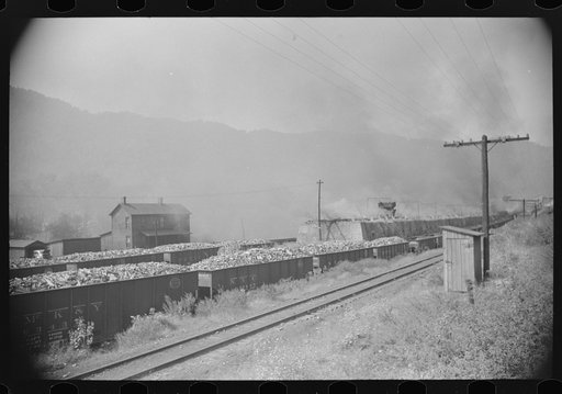 Coke ovens and burning slag heaps make heavy impenetrable smoke over whole town, day and night. Longacre, West Virginia