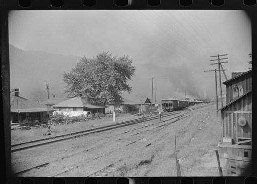 Untitled photo, possibly related to: Coke ovens and burning slag heaps make heavy impenetrable smoke over whole town, day and night. Longacre, West Virginia