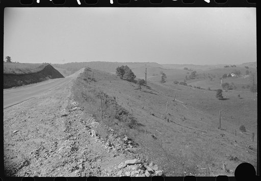 Untitled photo, possibly related to: Highway cutting across poor farmland between Morgantown and Elkins, West Virginia
