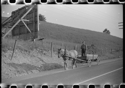 Farmer going to town along highway near Elkins, West Virginia