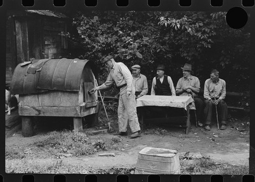 Untitled photo, possibly related to: Bohemian miners (coal loaders) unemployed since mechanization of mines. Jere, West Virginia. They live together in one house with a woman housekeeper. All on relief. Spend most of their time fighting about politics. Call their dog "Hitler" because he's so mean an