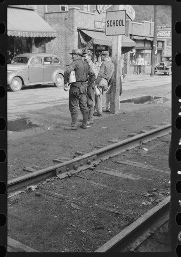 Untitled photo, possibly related to: Coal miners waiting for bus to go home, Osage, West Virginia