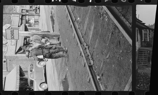 Untitled photo, possibly related to: Coal miners waiting for bus to go home, Osage, West Virginia
