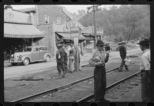 Untitled photo, possibly related to: Coal miners waiting for bus to go home, Osage, West Virginia