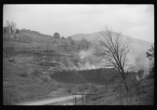 Untitled photo, possibly related to: General view from top of coal mine tressle, showing burning slag heaps and holes of slate, Maidsville, West Virginia