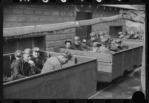 Untitled photo, possibly related to: Coal miners in cars ready for next "trip" into mines, Maidsville, West Virginia