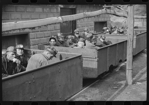 Untitled photo, possibly related to: Coal miners in cars ready for next "trip" into mines, Maidsville, West Virginia