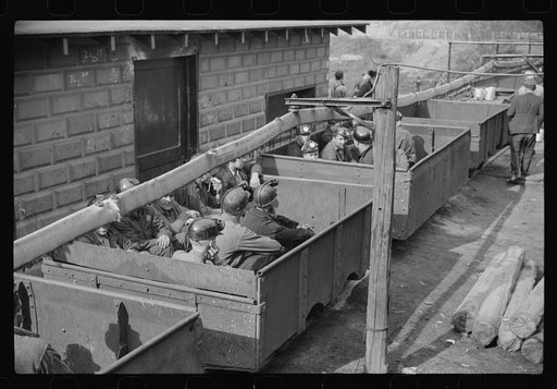 Untitled photo, possibly related to: Coal miners in cars ready for next "trip" into mines, Maidsville, West Virginia