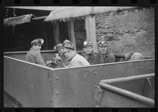 Untitled photo, possibly related to: Coal miners in cars ready for next "trip" into mines, Maidsville, West Virginia