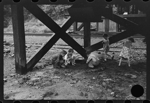 Untitled photo, possibly related to: Children's favorite playground, around coal mine tipples. Pursglove, Scotts Run, West Virginia