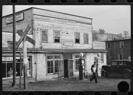 Untitled photo, possibly related to: Company store, Osage, West Virginia. Sack of flour in A&P. In same town costs sixty-nine cents and in company store costs one dollar and twenty-five cents