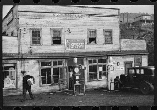 Untitled photo, possibly related to: Company store, Osage, West Virginia. Sack of flour in A&P. In same town costs sixty-nine cents and in company store costs one dollar and twenty-five cents