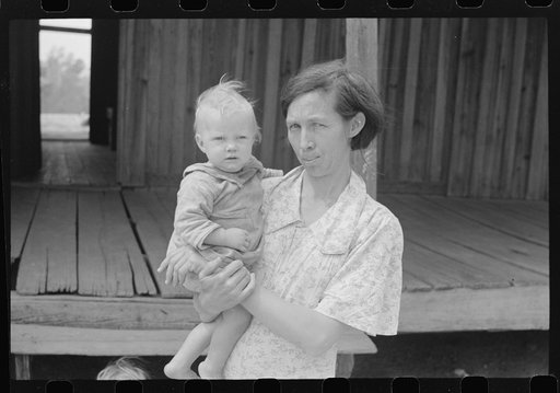 Untitled photo, possibly related to: Mrs. Ellis Adkins and her youngest child. The family are rehabilitation borrowers. There are seven children and this is their first year on the program. Coffee County, Alabama