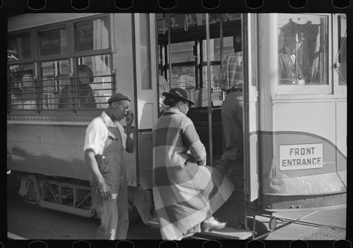 Untitled photo, possibly related to: Domestic servants waiting for street car on way to work early in the morning. Mitchell Street, Atlanta, Georgia