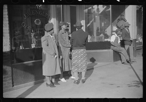 Untitled photo, possibly related to: Domestic servants waiting for streetcar on way to work early in the morning. Mitchell Street, Atlanta, Georgia
